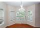 Sunny dining area features a chandelier and large windows at 5496 Clearview Dr, North Charleston, SC 29420