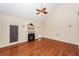 Spacious living room features hardwood floors, high ceilings, and a fireplace at 5496 Clearview Dr, North Charleston, SC 29420