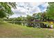 Community pond view showcasing the tranquil water and surrounding greenery at 5496 Clearview Dr, North Charleston, SC 29420
