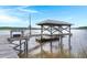 Well constructed boat dock with a boat lift and easy access to the water at 5703 St Angela Dr, North Charleston, SC 29418
