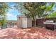 A wooden deck features a grill, shed, and seating area, providing an ideal outdoor entertaining space at 5703 St Angela Dr, North Charleston, SC 29418