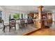 Cozy dining area with bright windows and adjacent to the kitchen at 5703 St Angela Dr, North Charleston, SC 29418
