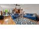 Bright and spacious living room featuring a dining room and an open kitchen at 5703 St Angela Dr, North Charleston, SC 29418