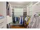 View of walk in closet featuring built in shelving and wooden flooring at 5703 St Angela Dr, North Charleston, SC 29418