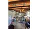 Unfinished garage featuring storage boxes and exposed ceiling beams at 5937 Willard Dr, Hanahan, SC 29410