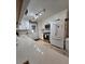 Bright kitchen features white cabinets, stainless steel appliances and durable quartz countertops at 5937 Willard Dr, Hanahan, SC 29410