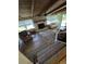 Expansive living room with vaulted ceilings, fireplace, and large windows at 5937 Willard Dr, Hanahan, SC 29410