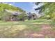 Spacious backyard surrounded by trees and greenery offering privacy at 621 Temple Rd # A, Ladson, SC 29456