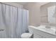 Bathroom with a white shower curtain, toilet, and a sink vanity at 621 Temple Rd # A, Ladson, SC 29456