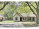 Charming single-story home with a well-manicured lawn and mature trees, offering a welcoming curb appeal at 621 Temple Rd # A, Ladson, SC 29456