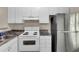 A well-lit kitchen showcasing white cabinets, appliances and countertops at 621 Temple Rd # A, Ladson, SC 29456
