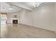 Spacious living room with hardwood floors and a fireplace, perfect for relaxing and entertaining guests at 621 Temple Rd # A, Ladson, SC 29456