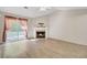 Bright living room featuring vaulted ceiling, hardwood floors, fireplace and sliding doors to the backyard at 621 Temple Rd # A, Ladson, SC 29456