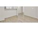 Open living space with wood floors, connecting seamlessly to the kitchen, creating a functional layout at 621 Temple Rd # A, Ladson, SC 29456