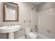 Bathroom features a pedestal sink, toilet, and shower over tub with neutral finishes at 642 Harbor Creek Pl # 21, Charleston, SC 29412