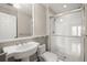 Bathroom with pedestal sink, toilet, and large glass enclosed shower with white subway tile at 642 Harbor Creek Pl # 21, Charleston, SC 29412