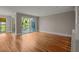 Spacious living room with beautiful hardwood floors, neutral walls, and natural light at 642 Harbor Creek Pl # 21, Charleston, SC 29412