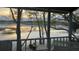 Screened porch view of marsh and waterways at sunset at 642 Harbor Creek Pl # 21, Charleston, SC 29412