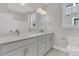 Bathroom featuring double sink vanity with white cabinets and modern fixtures at 701 Maynard Ln, Summerville, SC 29486