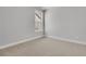 Comfortable bedroom with neutral carpet, light walls, and large window at 701 Maynard Ln, Summerville, SC 29486