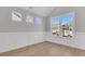 Inviting living room with decorative moldings, large windows and wood-look flooring at 701 Maynard Ln, Summerville, SC 29486