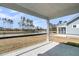 Covered patio with serene waterfront views at 701 Maynard Ln, Summerville, SC 29486