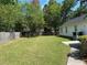 Expansive backyard with lush green grass and privacy fence at 732 Gahagan Rd, Summerville, SC 29485