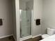 Bathroom featuring a walk-in shower, new toilet, and updated lighting at 732 Gahagan Rd, Summerville, SC 29485