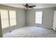 Spacious bedroom with carpet, ceiling fan, and bright windows offering natural light at 732 Gahagan Rd, Summerville, SC 29485