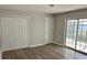 Bedroom featuring hardwood flooring and sliding glass door at 732 Gahagan Rd, Summerville, SC 29485