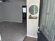 Inviting entryway with decorative glass door and accent mirror at 732 Gahagan Rd, Summerville, SC 29485