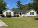 Charming single-story home with manicured lawn and inviting curb appeal at 732 Gahagan Rd, Summerville, SC 29485
