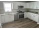 Modern kitchen with granite countertops, stainless steel appliances, and lots of natural light at 732 Gahagan Rd, Summerville, SC 29485