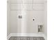 Functional laundry room featuring patterned tile flooring, essential hookups, and efficient storage solutions for streamlined convenience at 739 Maynard Ln, Summerville, SC 29486
