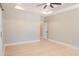 A spacious, light-filled bedroom with wood floors, a ceiling fan, and recessed lighting at 74 Longleaf Dr, Walterboro, SC 29488