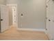 Bedroom with light wood floors and white doors at 74 Longleaf Dr, Walterboro, SC 29488
