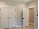 Bedroom with large closet and light wood floors at 74 Longleaf Dr, Walterboro, SC 29488