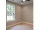 Bedroom featuring a large window and ceiling fan at 74 Longleaf Dr, Walterboro, SC 29488