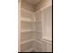 Clean white closet featuring adjustable shelving for organized storage of clothing and accessories at 74 Longleaf Dr, Walterboro, SC 29488