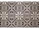 The patterned tile flooring features a detailed black and white design, adding character to the space at 74 Longleaf Dr, Walterboro, SC 29488