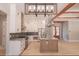 Open concept kitchen with granite counters, stainless appliances, and custom lighting at 74 Longleaf Dr, Walterboro, SC 29488