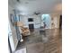 Inviting living room featuring a fireplace, built-in shelving and dark hardwood floors at 7406 Purser Ln, Hanahan, SC 29410