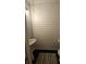 Charming powder room with a pedestal sink, ship lap, and stylish fixtures at 7406 Purser Ln, Hanahan, SC 29410