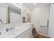Neutral bathroom features a white vanity, hardwood floors, and shower/tub combo at 754 Summerwind Cir, Edisto Island, SC 29438