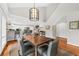Open dining area featuring stylish lighting, seating for six, and bright, airy atmosphere at 754 Summerwind Cir, Edisto Island, SC 29438
