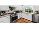 Modern kitchen with stainless steel appliances and white cabinets, providing a clean and functional space at 754 Summerwind Cir, Edisto Island, SC 29438