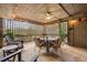 Inviting covered patio with outdoor seating and decorative string lights at 754 Summerwind Cir, Edisto Island, SC 29438