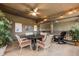 Relaxing outdoor patio featuring comfortable seating, ceiling fan, and serene views at 754 Summerwind Cir, Edisto Island, SC 29438