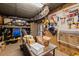 Well-organized storage area featuring an industrial table, pegboard, and utility connections at 754 Summerwind Cir, Edisto Island, SC 29438