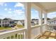 Exterior view from covered porch overlooking a neighborhood with similar style homes at 757 Maynard Ln, Summerville, SC 29486
